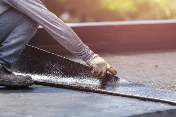 Professional Basement Waterproofing technician working in Loretto, PA